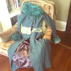 Karen Millen, English designer, blue coat